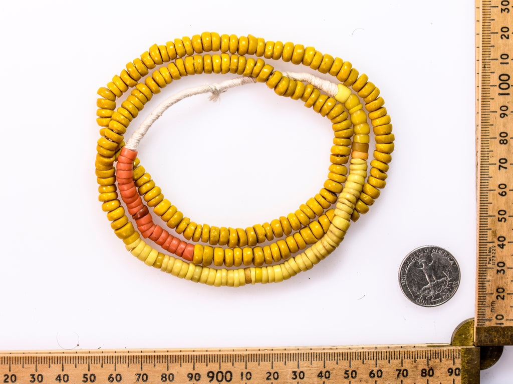 A Strand of Old Bohemian Kakamba Beads in Yellow and Light Red