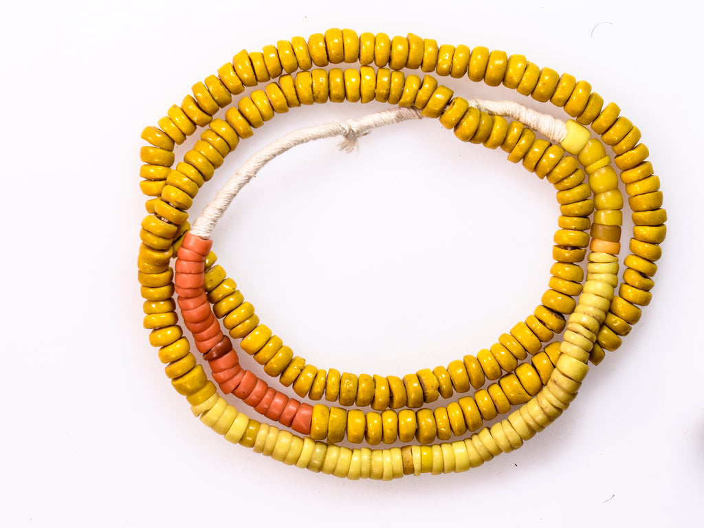 A Strand of Old Bohemian Kakamba Beads in Yellow and Light Red