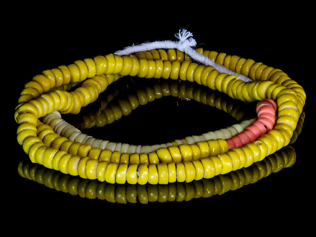A Strand of Old Bohemian Kakamba Beads in Yellow and Light Red