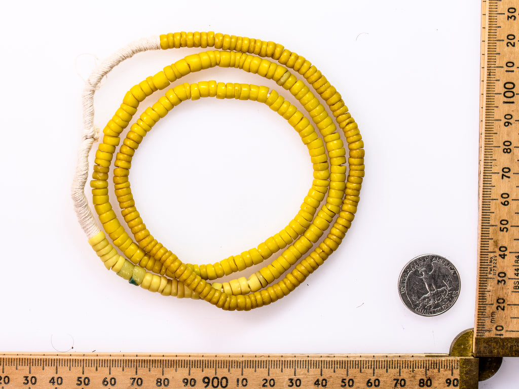 A Strand of Old Bohemian Kakamba Beads in Two Shades of Yellow