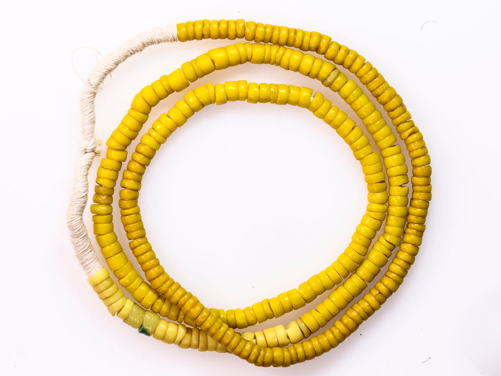 A Strand of Old Bohemian Kakamba Beads in Two Shades of Yellow