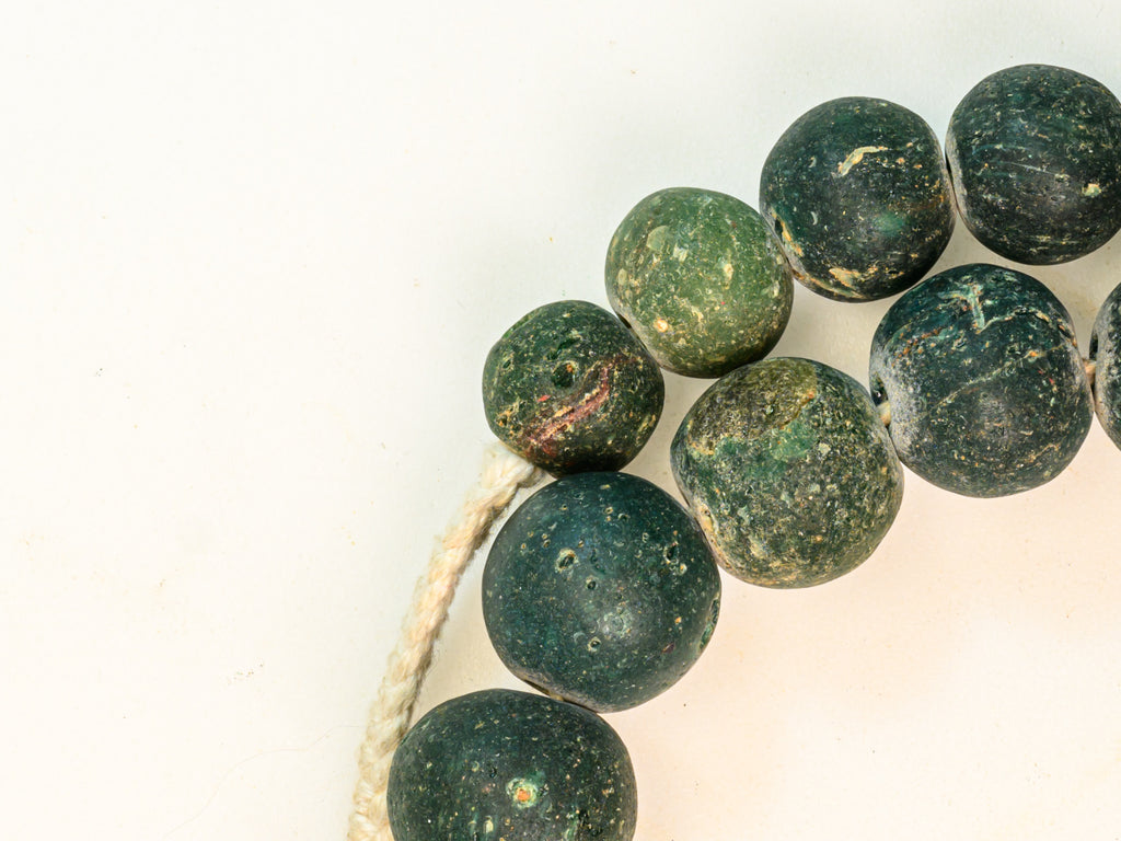 AIG100,100-299, Ancient Beads, Ancient Glass Bead, Ancient medieval bead, Byzantine glass bead, D'jenne Glass Bead, Excavated  Bead, Islamic Period bead, Islamic period glass bead