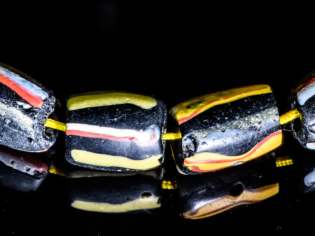 Antique Venetian African Trade Black Beads With Yellow, Green Red and White Stripes, group of 14