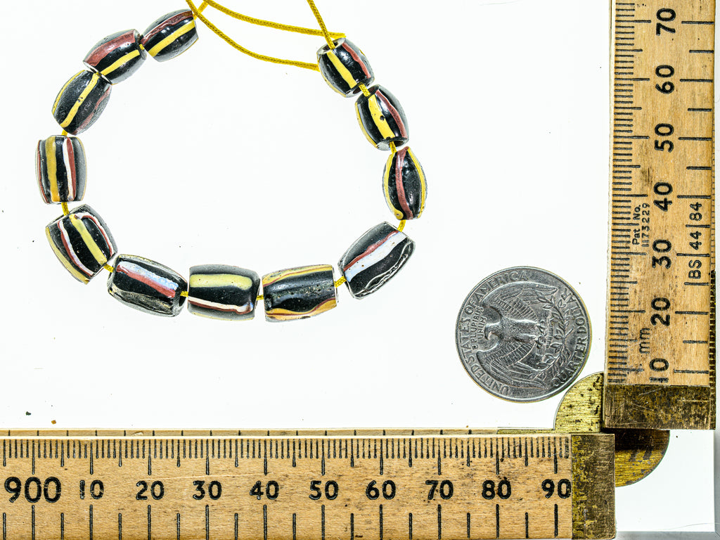 Antique Venetian African Trade Black Beads With Yellow, Green Red and White Stripes, group of 14