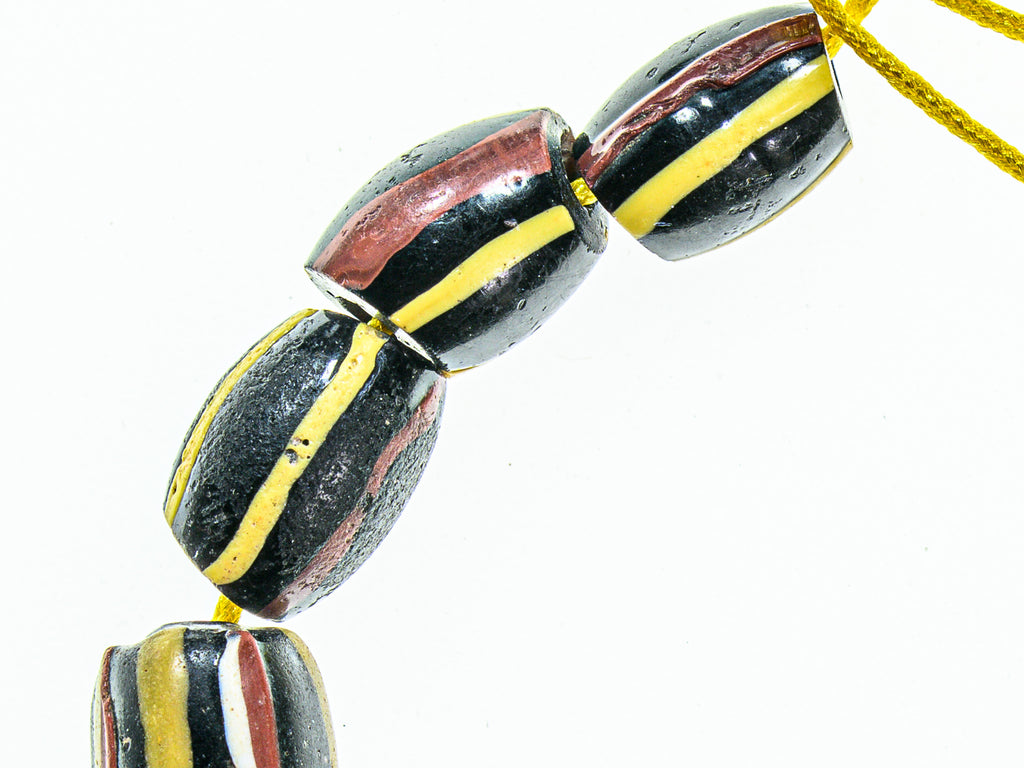 Antique Venetian African Trade Black Beads With Yellow, Green Red and White Stripes, group of 14