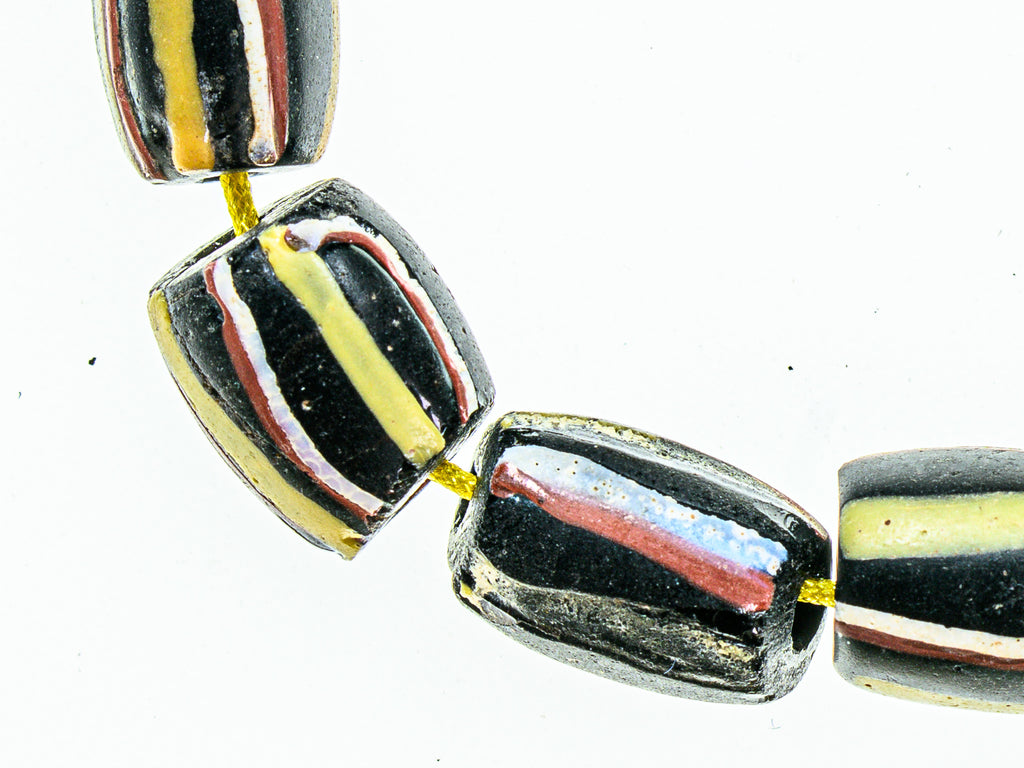 Antique Venetian African Trade Black Beads With Yellow, Green Red and White Stripes, group of 14