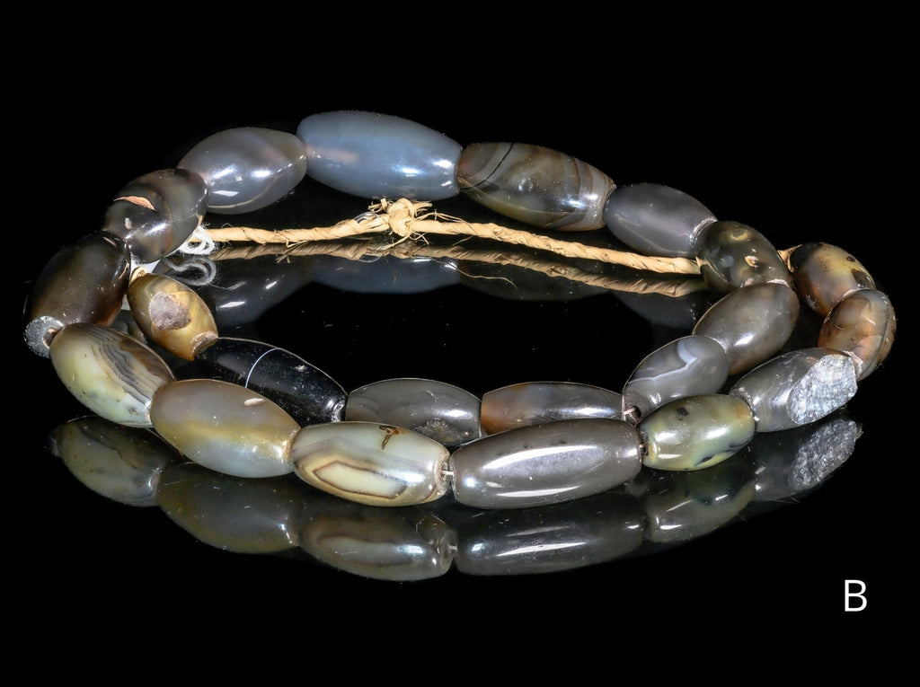 A Strand of Vintage African Trade Gray-Brown Agate Bicone Beads