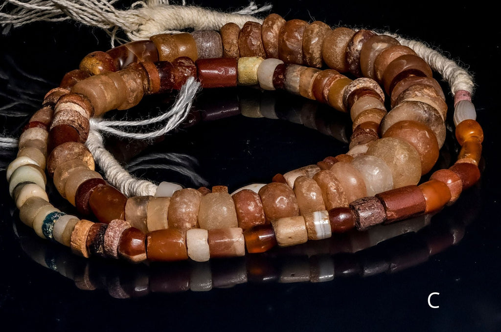 Ancient excavated strand of carnelian agate
