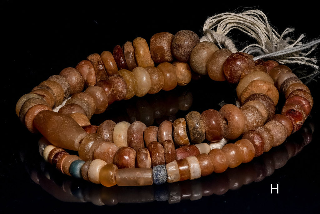 Ancient excavated strand of carnelian agate
