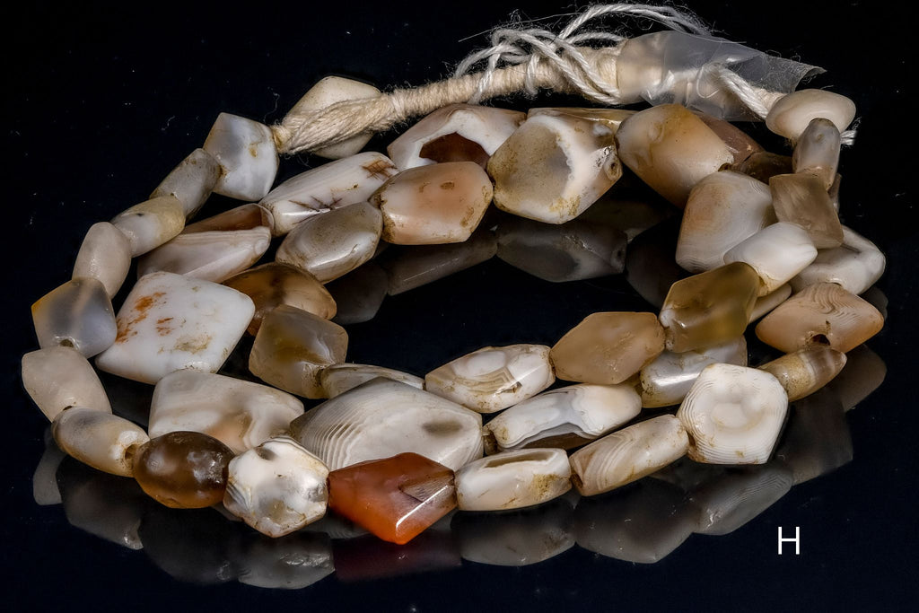 Ancient excavated rare diamond-shaped agate strand