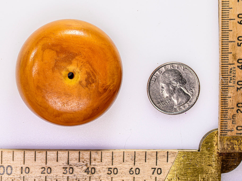 A Very Large "African Amber" Phenolic Resin Bead from Morocco