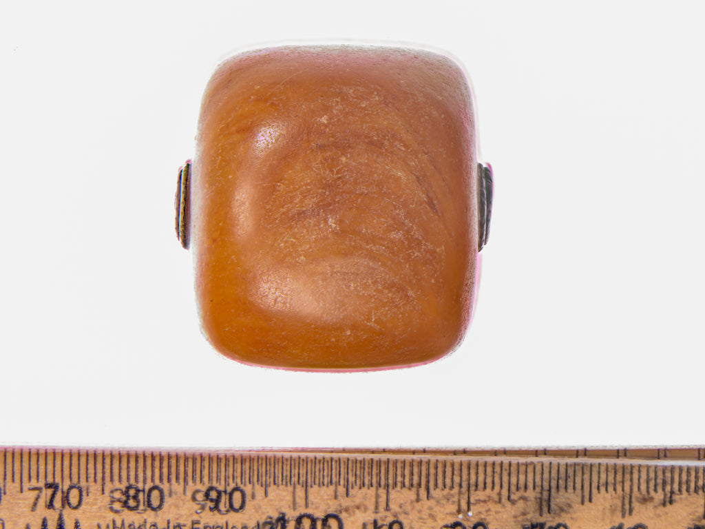 A Very Large Antique Natural Pressed  Baltic Amber Capped Bead From the African Trade