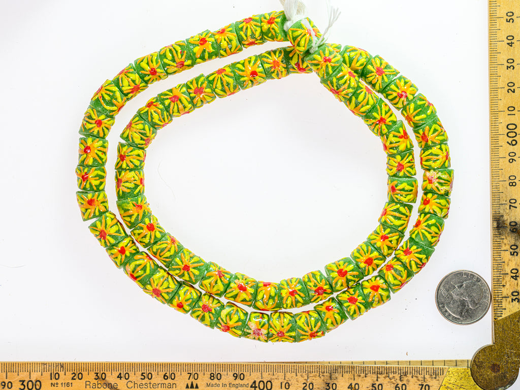 Recycled Glass Beads from Ghana - green with orange and yellow sunburst pattern - M00355