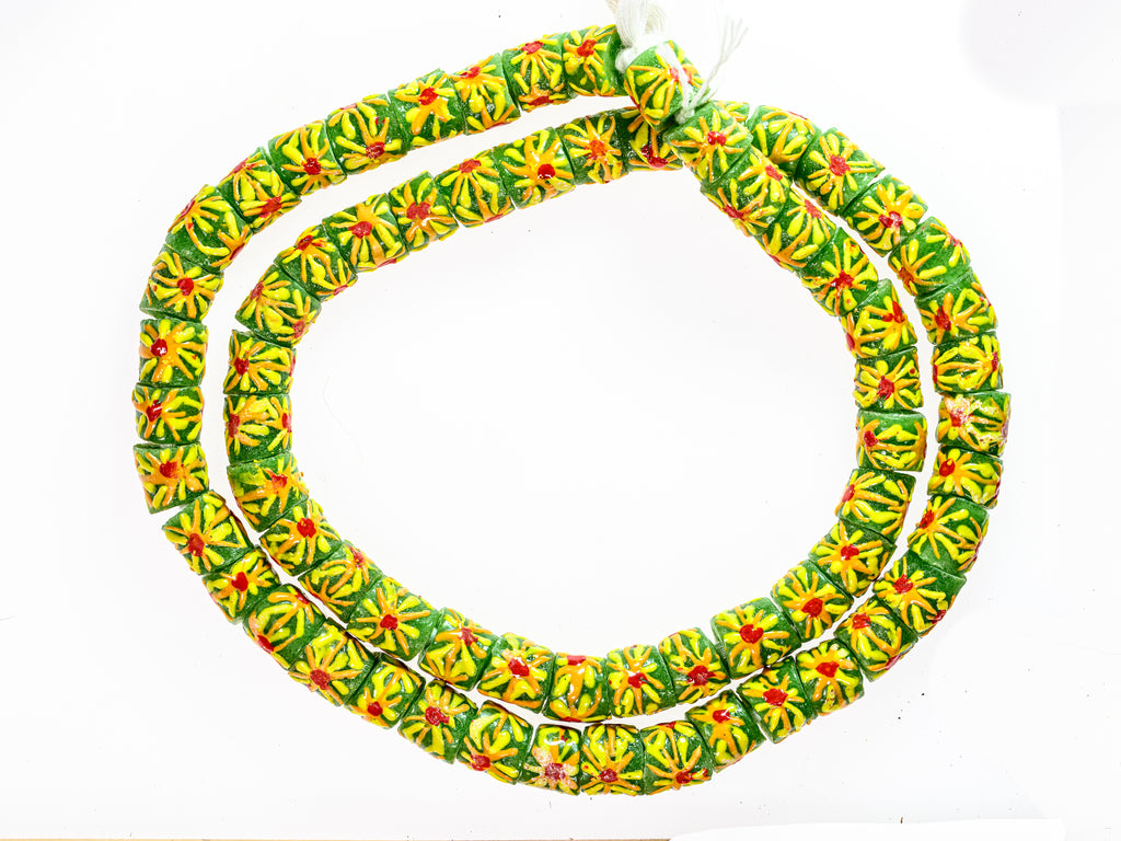 Recycled Glass Beads from Ghana - green with orange and yellow sunburst pattern - M00355