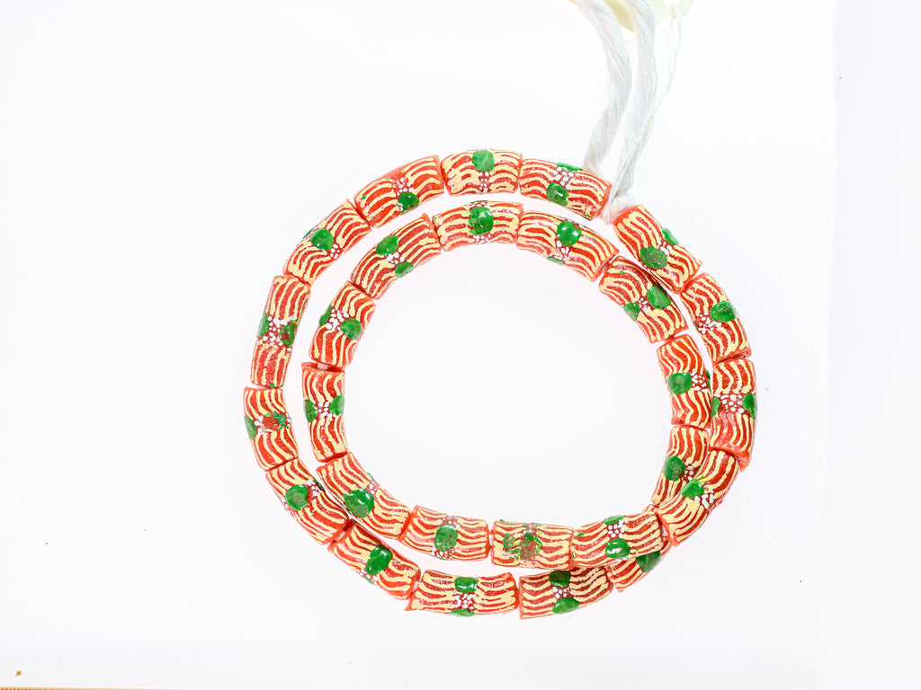 Recycled Glass Beads from Ghana - orange with white and green pattern - M00377