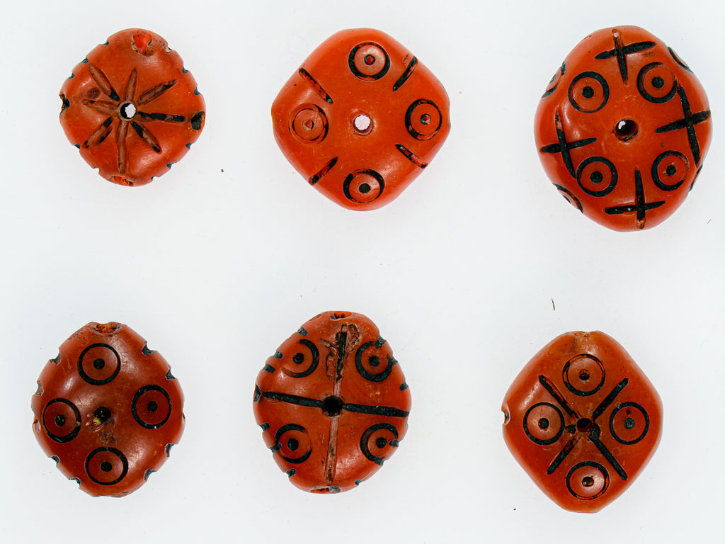 A Group of 6 Dark Orange Faux Amber Carved Diamond-Shaped Resin Beads from Morocco