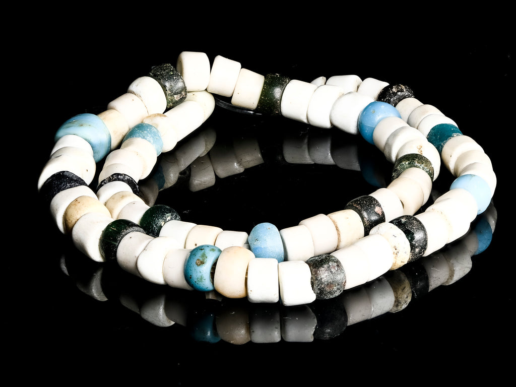A Strand Of Antique African Trade Bohemian Tubular White, Blue, and Black Glass Beads