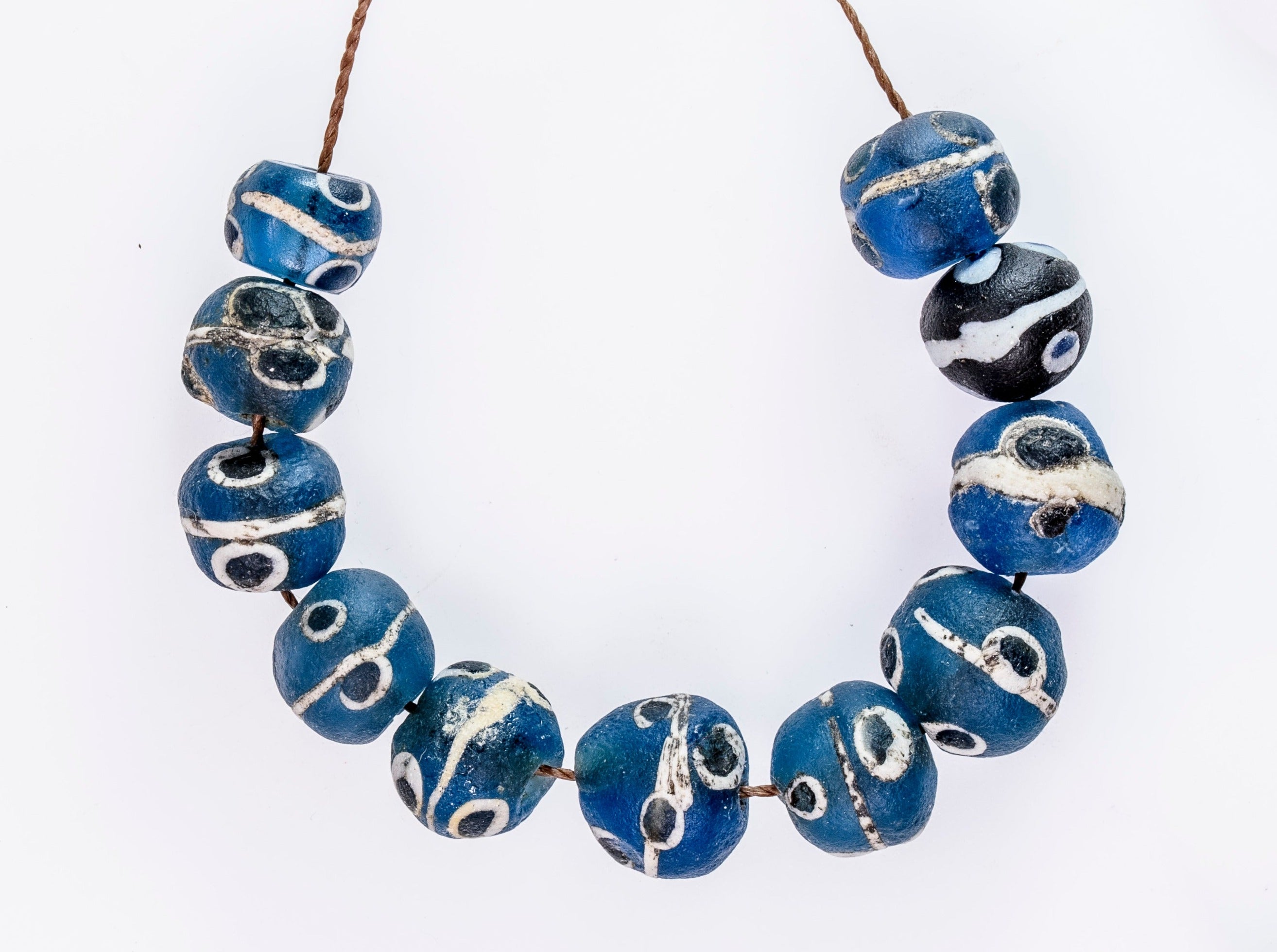 Ancient Excavated Islamic Translucent Blue Glass Evil Eye Beads – Venerable  Bead Company