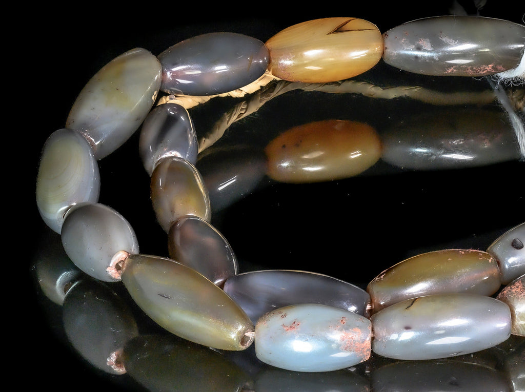 A Strand of Vintage African Trade Gray-Brown Agate Bicone Beads