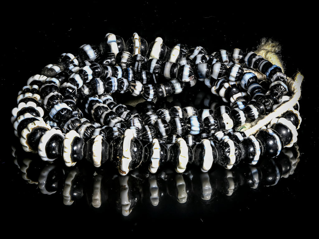 Dogtooth Black and White Ruffled African trade wound decorated glass beads