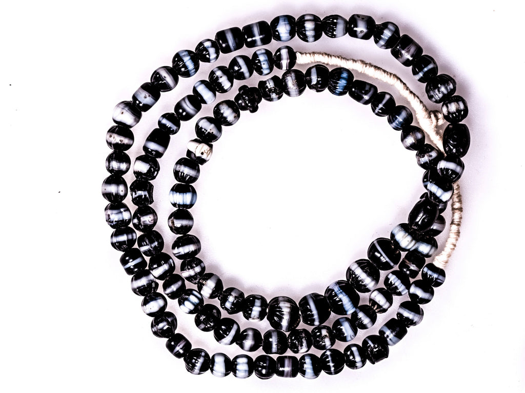 Dogtooth Black and White Ruffled African trade wound decorated glass beads