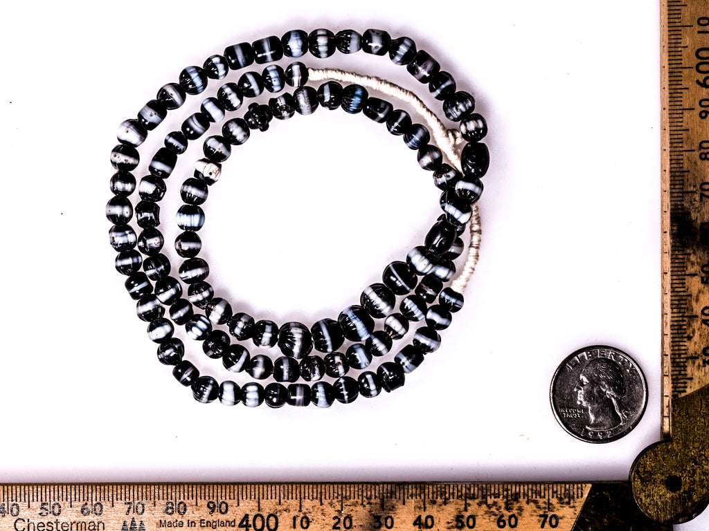 Dogtooth Black and White Ruffled African trade wound decorated glass beads