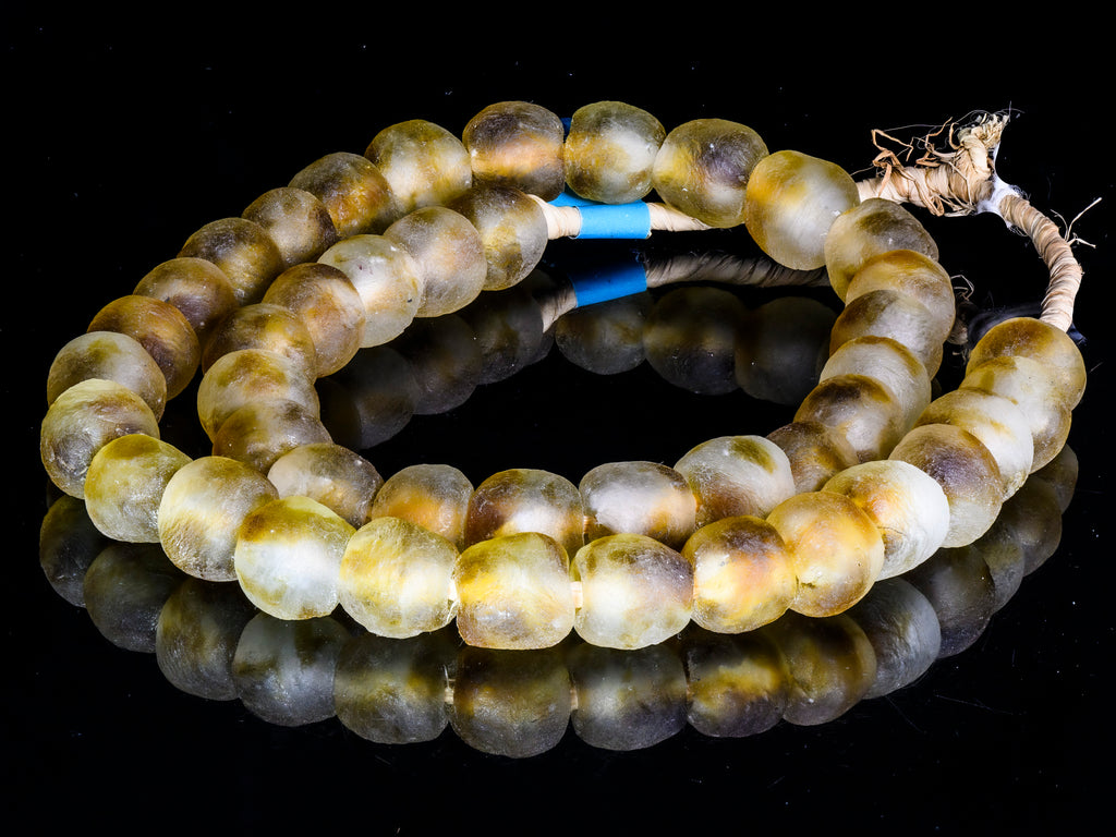 A 23" Strand of Recycled Glass Beads from Ghana, Amber Swirl 