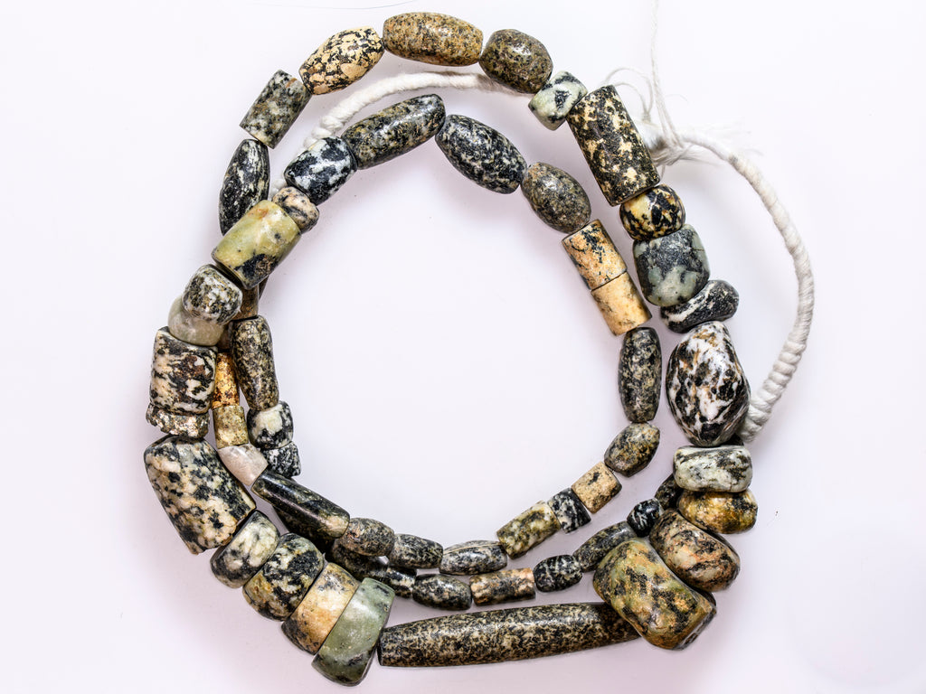 Ancient Excavated Granite Gneiss Beads from West Africa