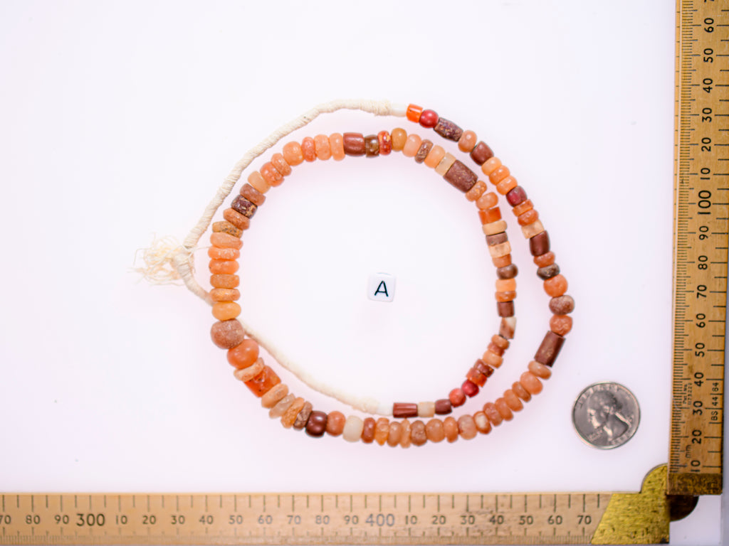 Ancient excavated mixed strand of agate, and other ancient stone