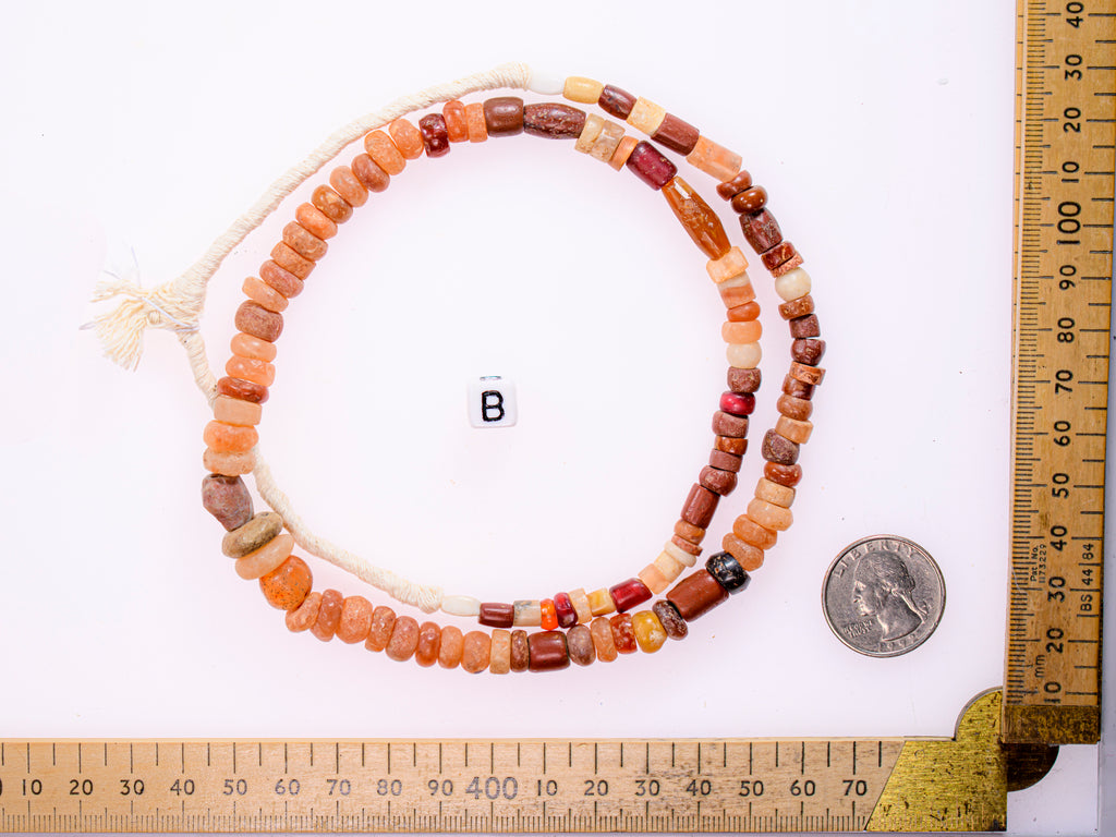 Ancient excavated mixed strand of agate, and other ancient stone