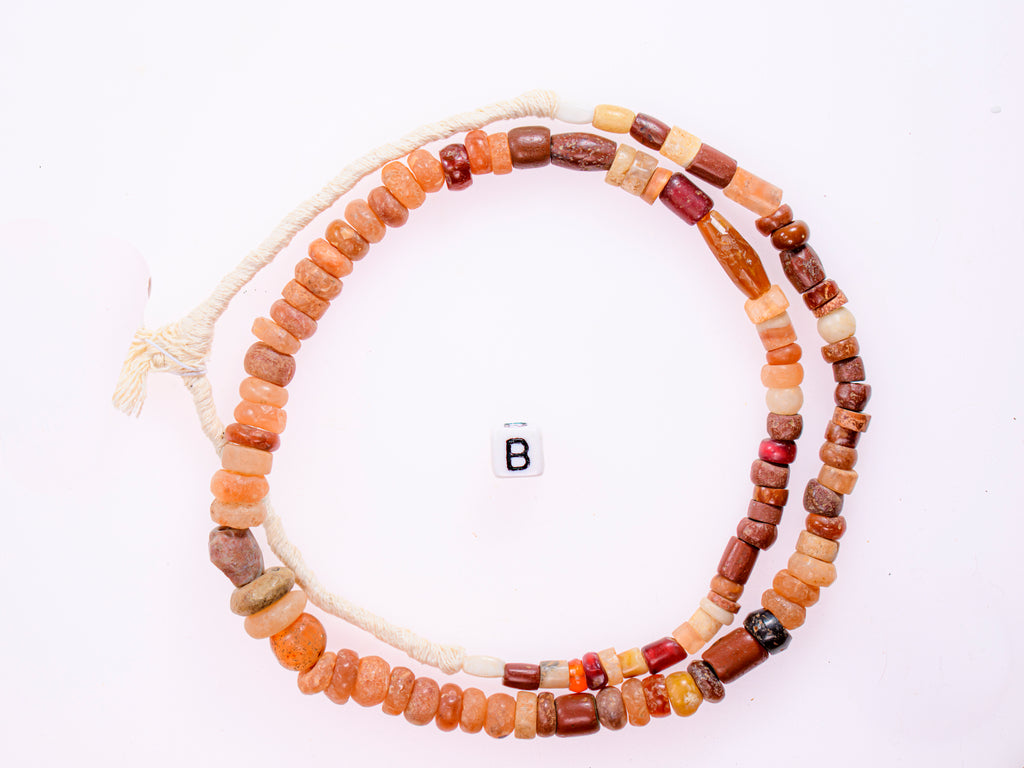 Ancient excavated mixed strand of agate, and other ancient stone