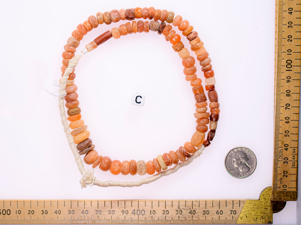 Ancient excavated mixed strand of agate, and other ancient stone