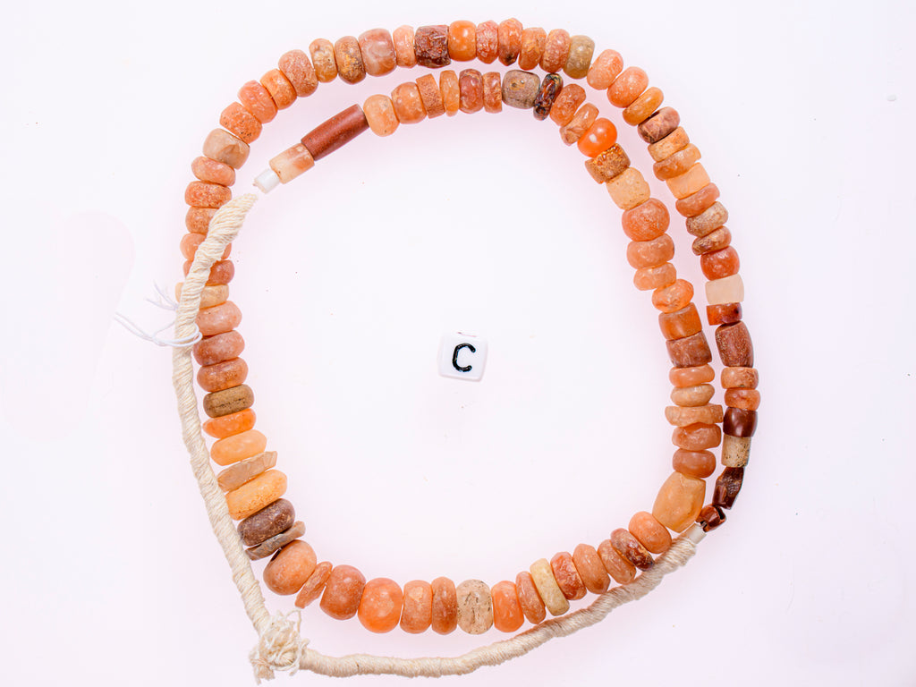 Ancient excavated mixed strand of agate, and other ancient stone