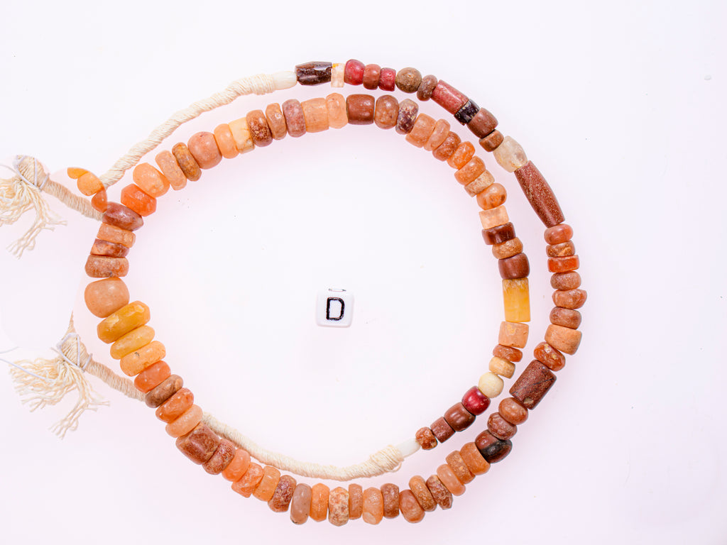 Ancient excavated mixed strand of agate, and other ancient stone