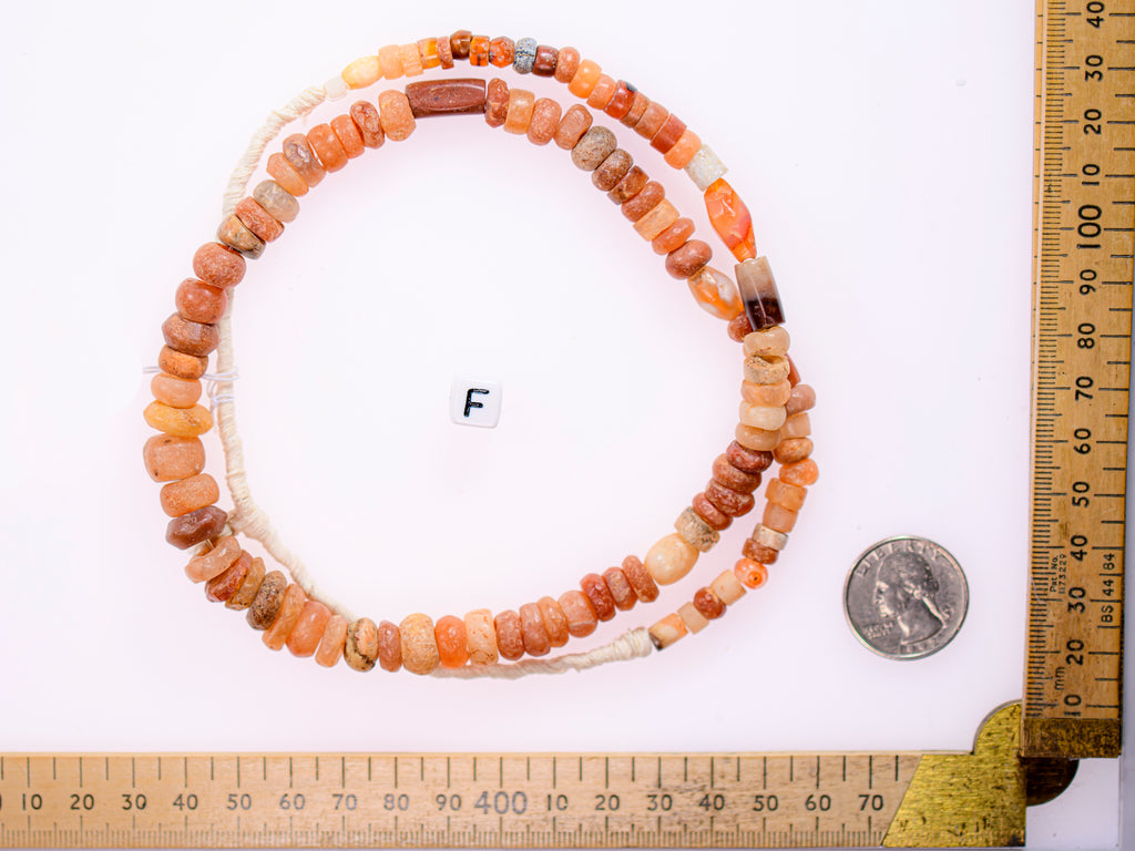 Ancient excavated mixed strand of agate, and other ancient stone