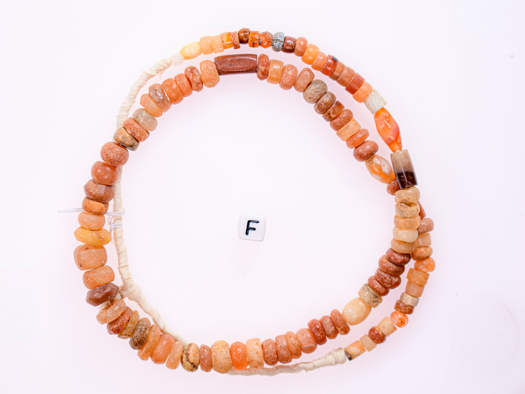 Ancient excavated mixed strand of agate, and other ancient stone