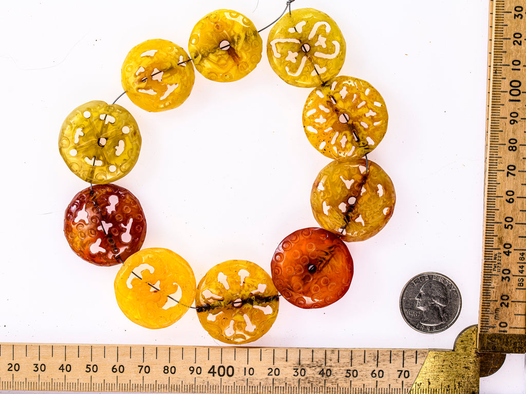 A Short Strand of 10 Carved Phenolic Resin Beads, North Africa