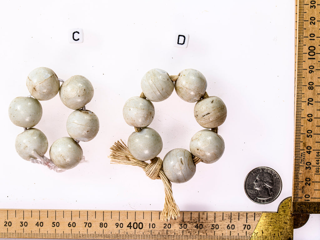 A Short Strand of 6 Antique European Matte White Beads from the African Trade