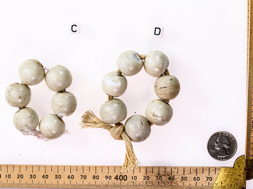 A Short Strand of 6 Antique European Matte White Beads from the African Trade
