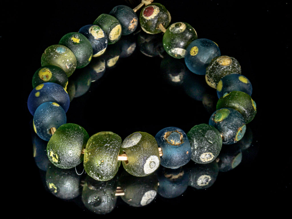AIG200,100-299, Ancient Beads, Ancient Glass Bead, Ancient medieval bead, Blue Evil Eye Bead, Byzantine glass bead, D'jenne Glass Bead, Evil Eye Beads, Excavated  Bead, Islamic Period bead, Islamic period glass bead