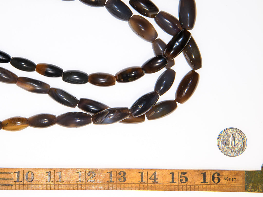 A Strand of Vintage African Trade Gray-Brown Agate Bicone Beads