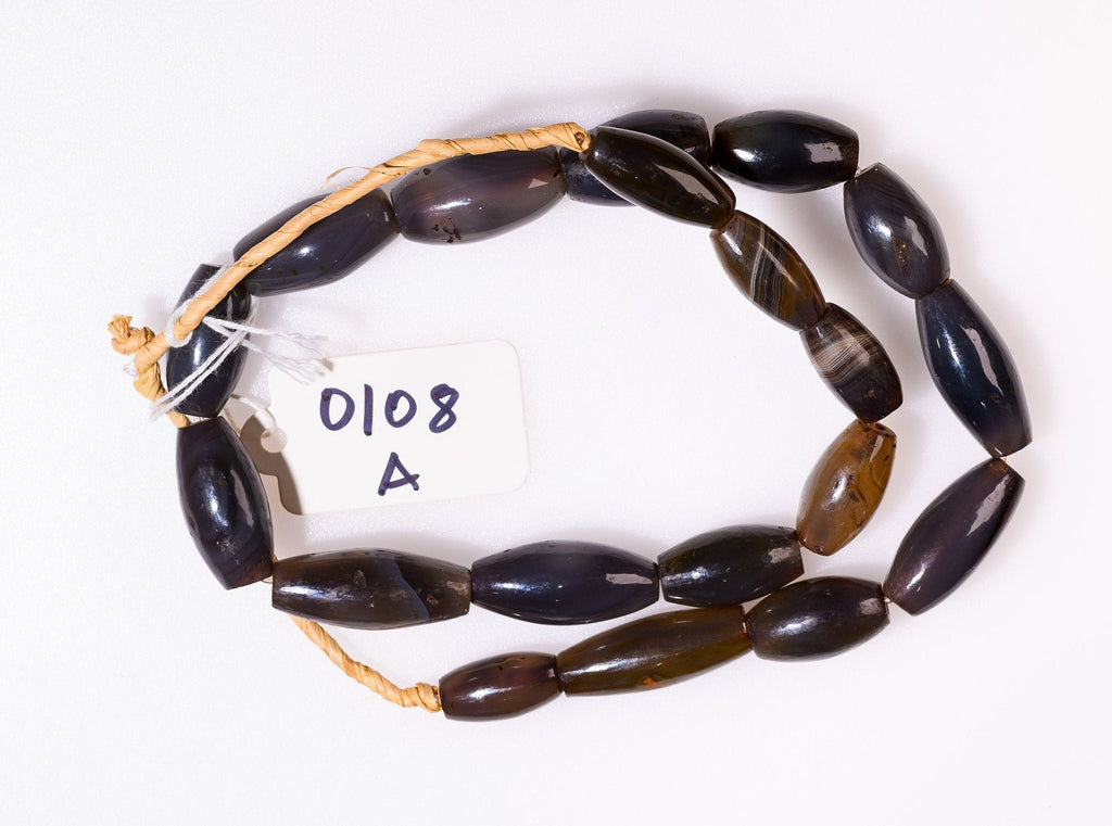 A Strand of Vintage African Trade Gray-Brown Agate Bicone Beads