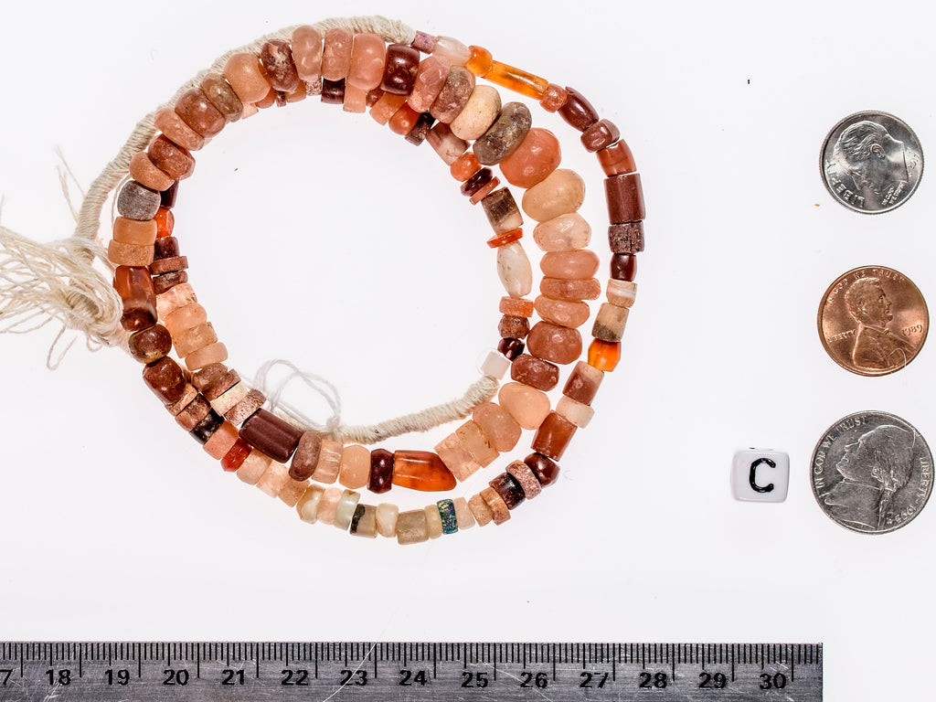 Ancient excavated strand of carnelian agate 302A-H