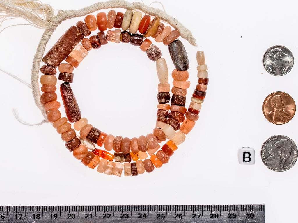 Ancient excavated strand of carnelian agate 302A-H