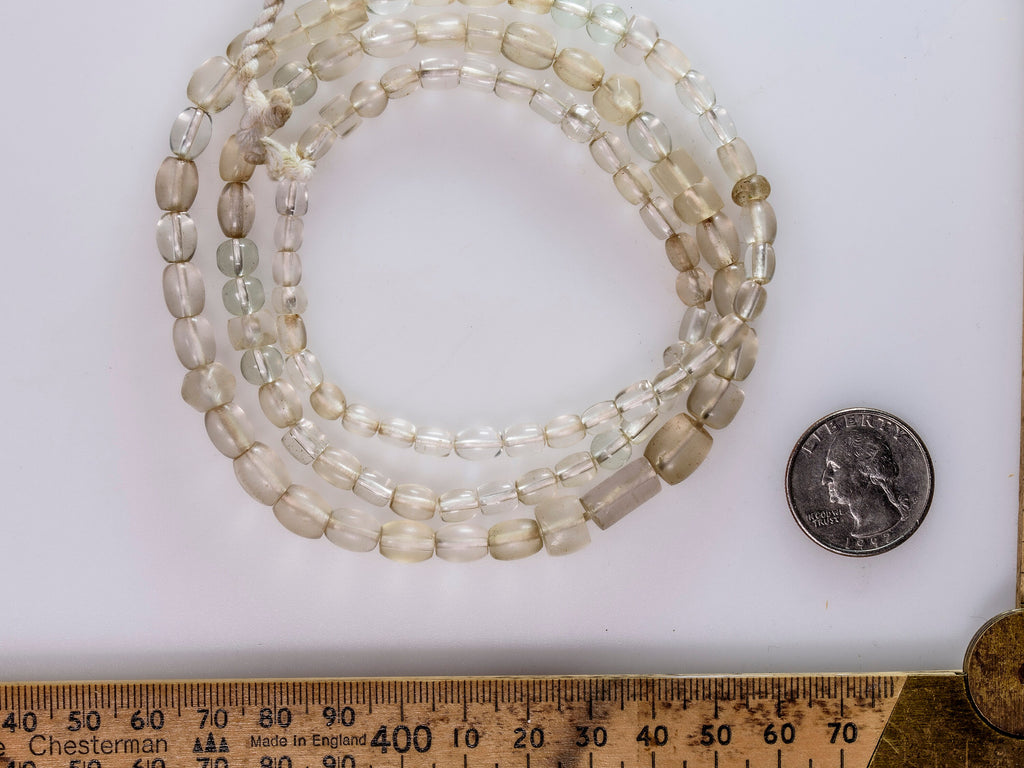 A strand of Antique Bohemian Crystal Clear Mostly Oval African Trade Beads