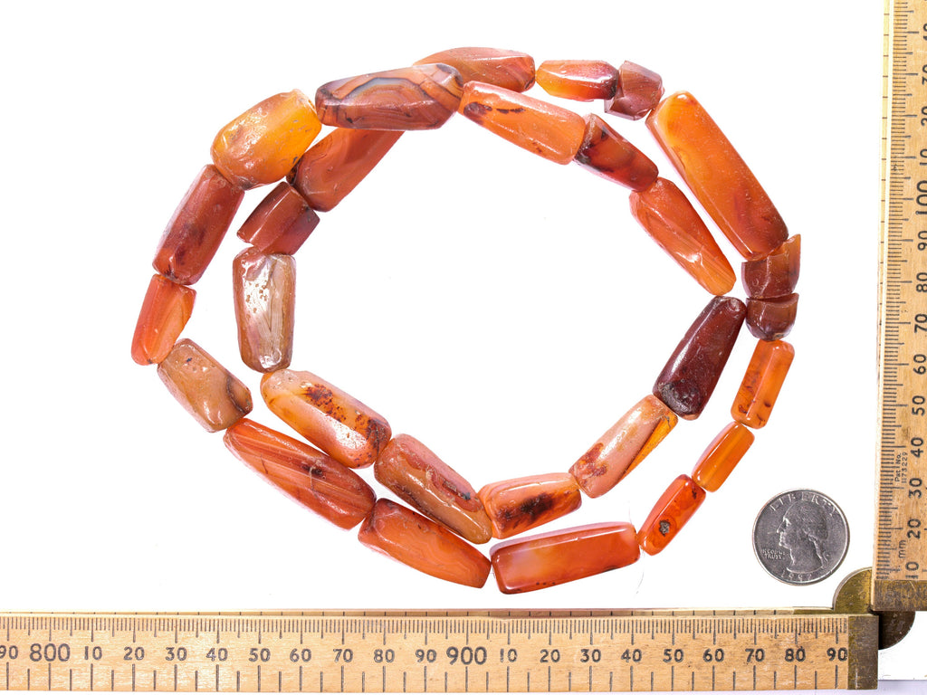 A Strand of Vintage African Trade  Idar Oberstein Carnelian Agate Cylindrical Beads