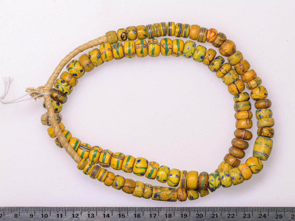 A Strand of Antique Venetian African Trade Beads in Yellow hues  (0262F)