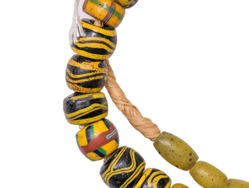 A Strand of Antique Venetian and Bohemian African Trade Beads in Yellow hues  (0262A)