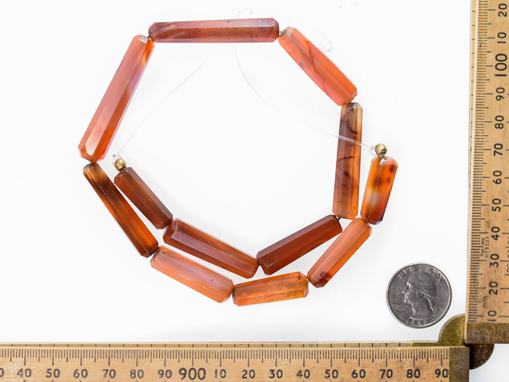 A Strand of Vintage African Trade  Idar Oberstein Carnelian Agate Cylindrical Beads