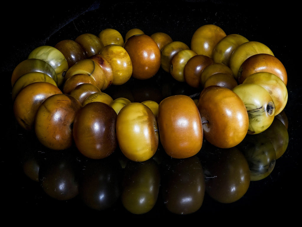 A Long Mixed Strand of Vintage  Phenolic Resin and Amber,  African Trade